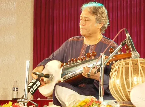The Amjad Ali Khan card